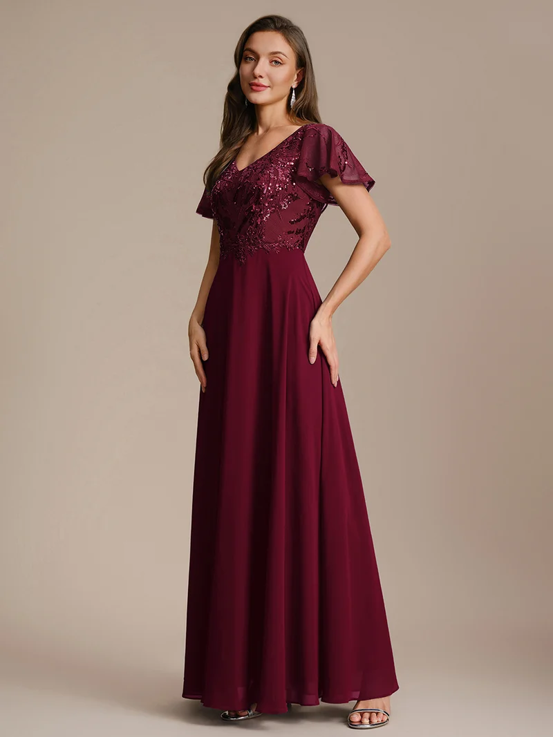 Robe longue stretch col en V avec volants et appliqués