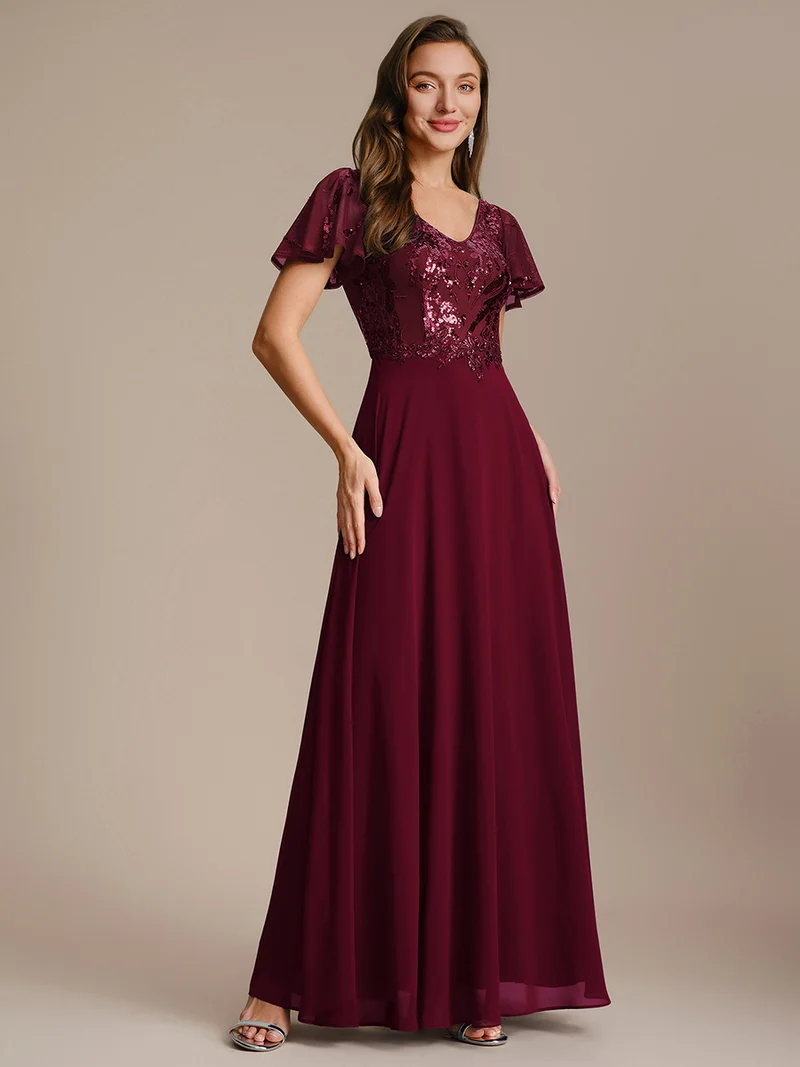 Robe longue stretch col en V avec volants et appliqués