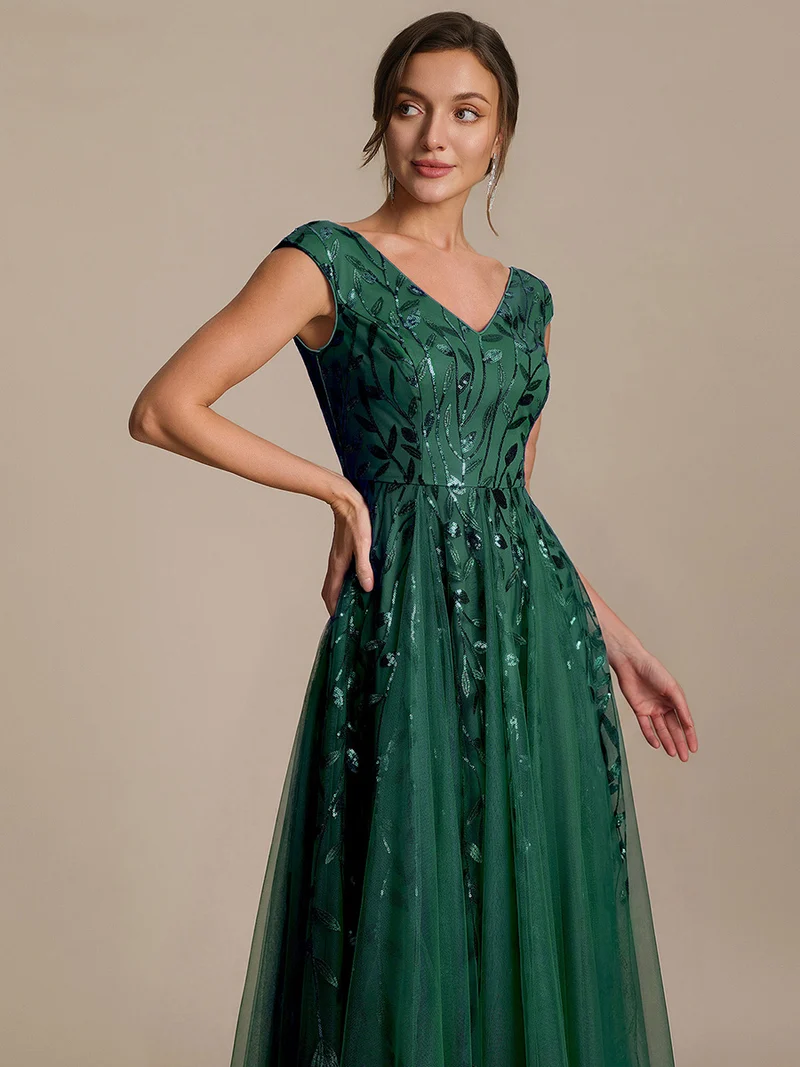Robe midi sans manches col en V à sequins et coupe évasée