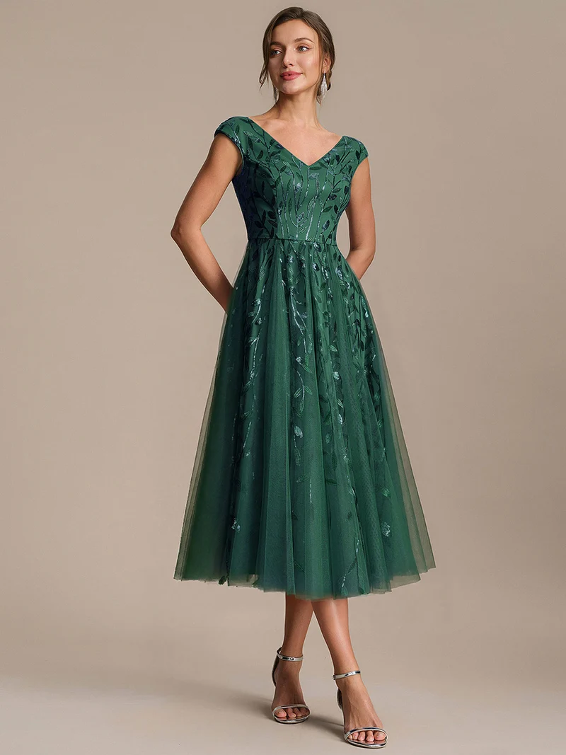 Robe midi sans manches col en V à sequins et coupe évasée