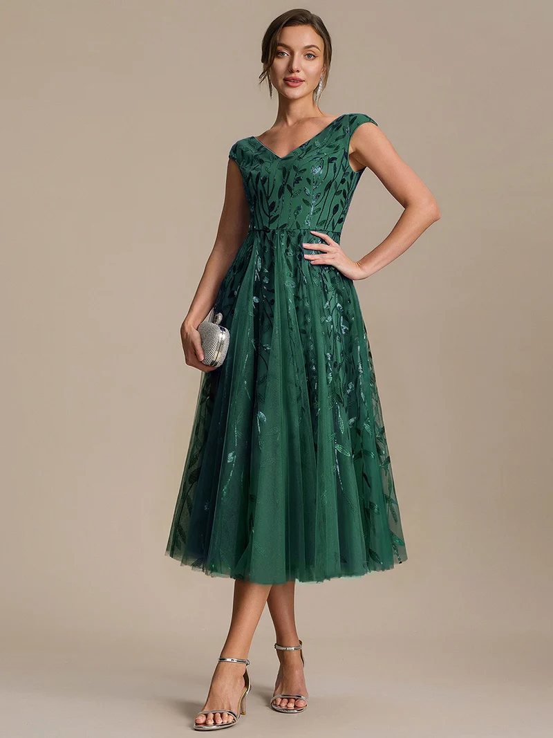 Robe midi sans manches col en V à sequins et coupe évasée
