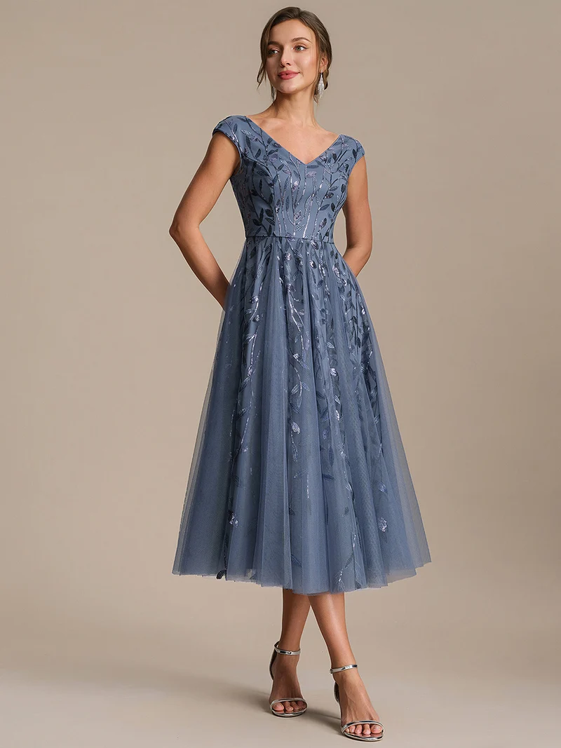 Robe midi sans manches col en V à sequins et coupe évasée