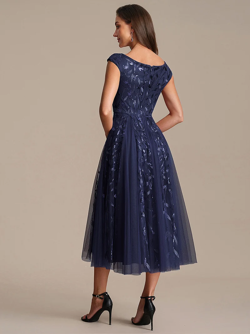 Robe midi sans manches col en V à sequins et coupe évasée