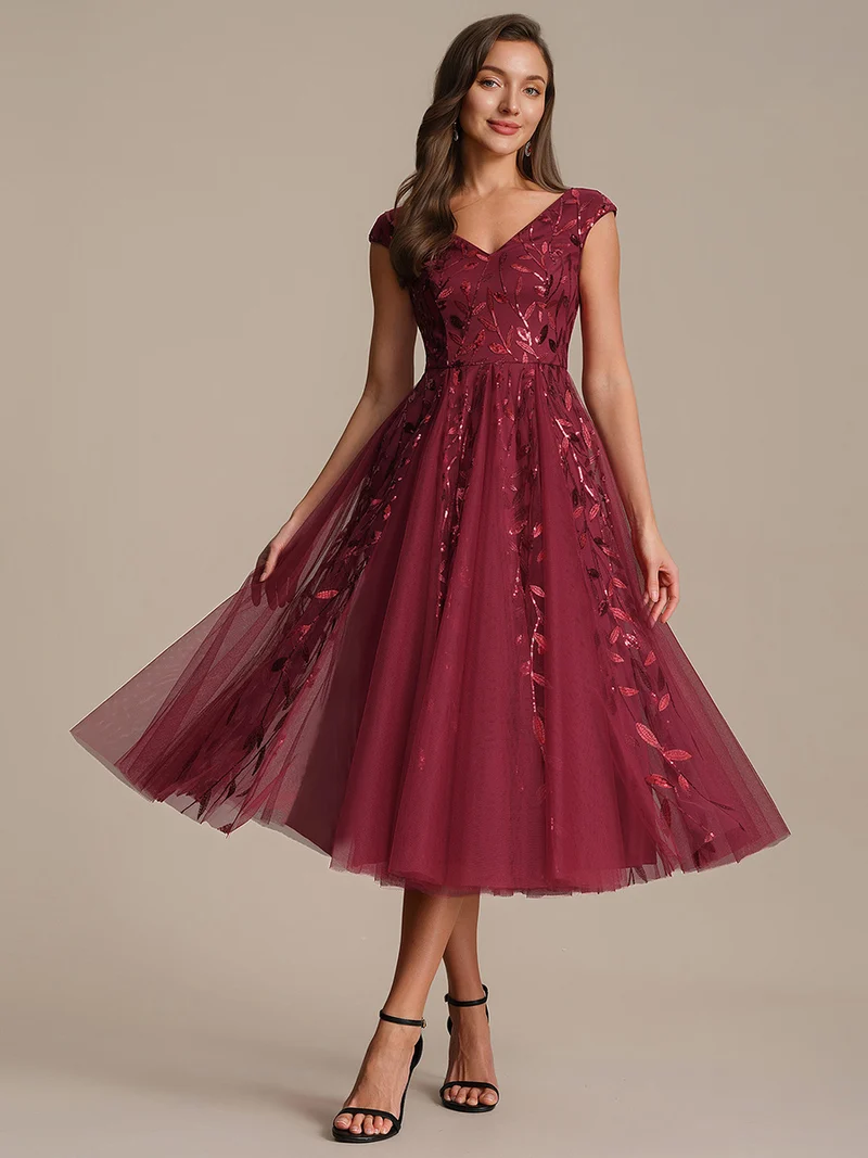 Robe midi sans manches col en V à sequins et coupe évasée