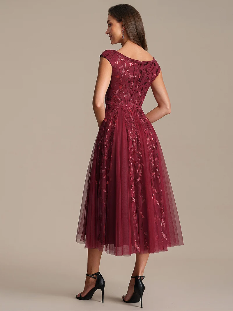Robe midi sans manches col en V à sequins et coupe évasée