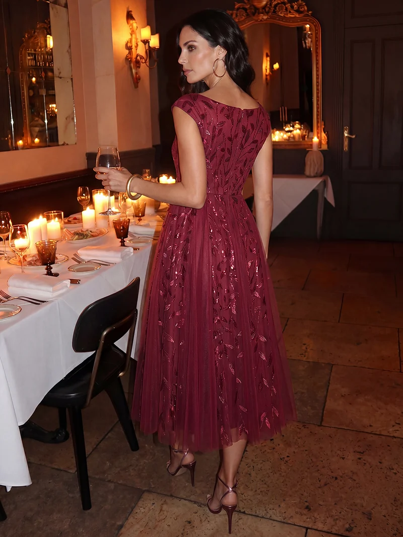 Robe midi sans manches col en V à sequins et coupe évasée