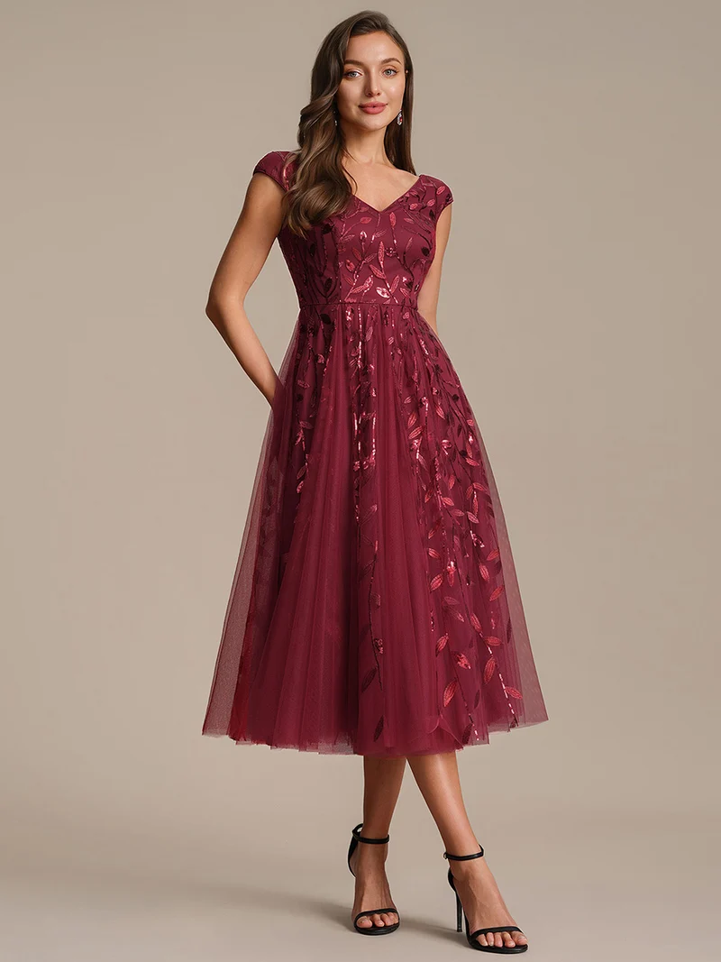 Robe midi sans manches col en V à sequins et coupe évasée