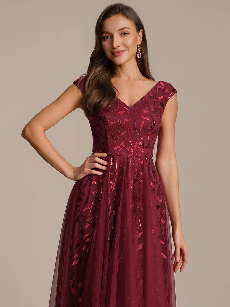 Robe midi sans manches col en V à sequins et coupe évasée