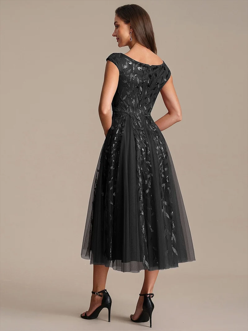 Robe midi sans manches col en V à sequins et coupe évasée