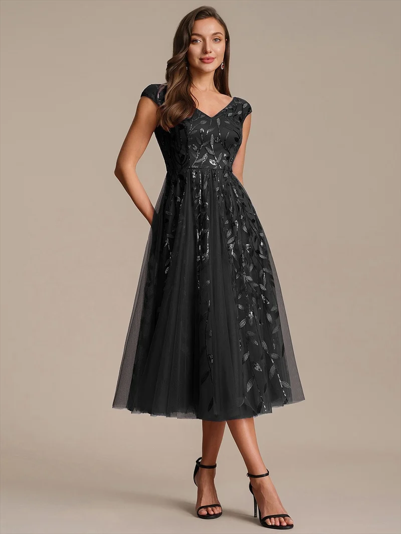 Robe midi sans manches col en V à sequins et coupe évasée