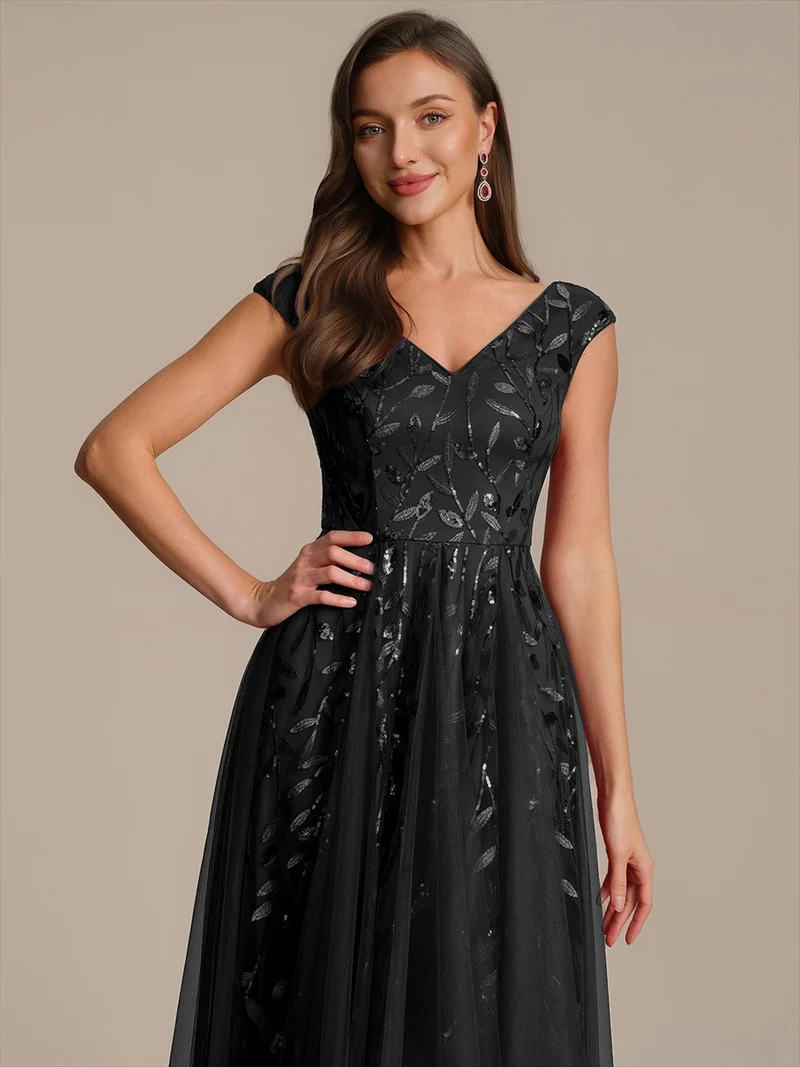 Robe midi sans manches col en V à sequins et coupe évasée