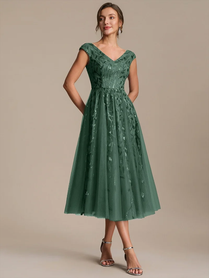 Robe midi sans manches col en V à sequins et coupe évasée