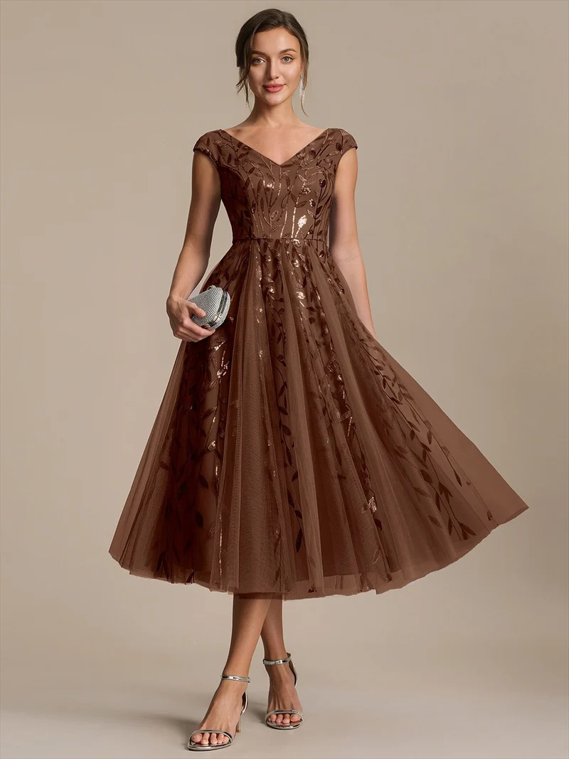 Robe midi sans manches col en V à sequins et coupe évasée