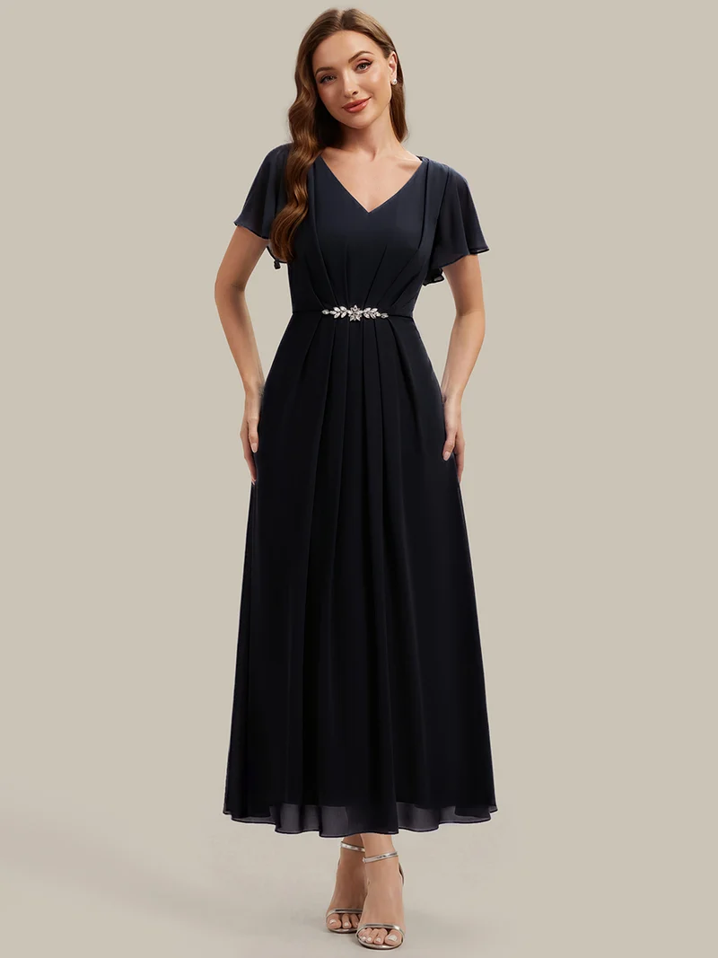 Robe d'invitée à col en V orné de strass et manches à volants