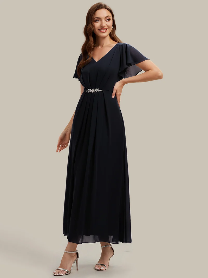 Robe d'invitée à col en V orné de strass et manches à volants