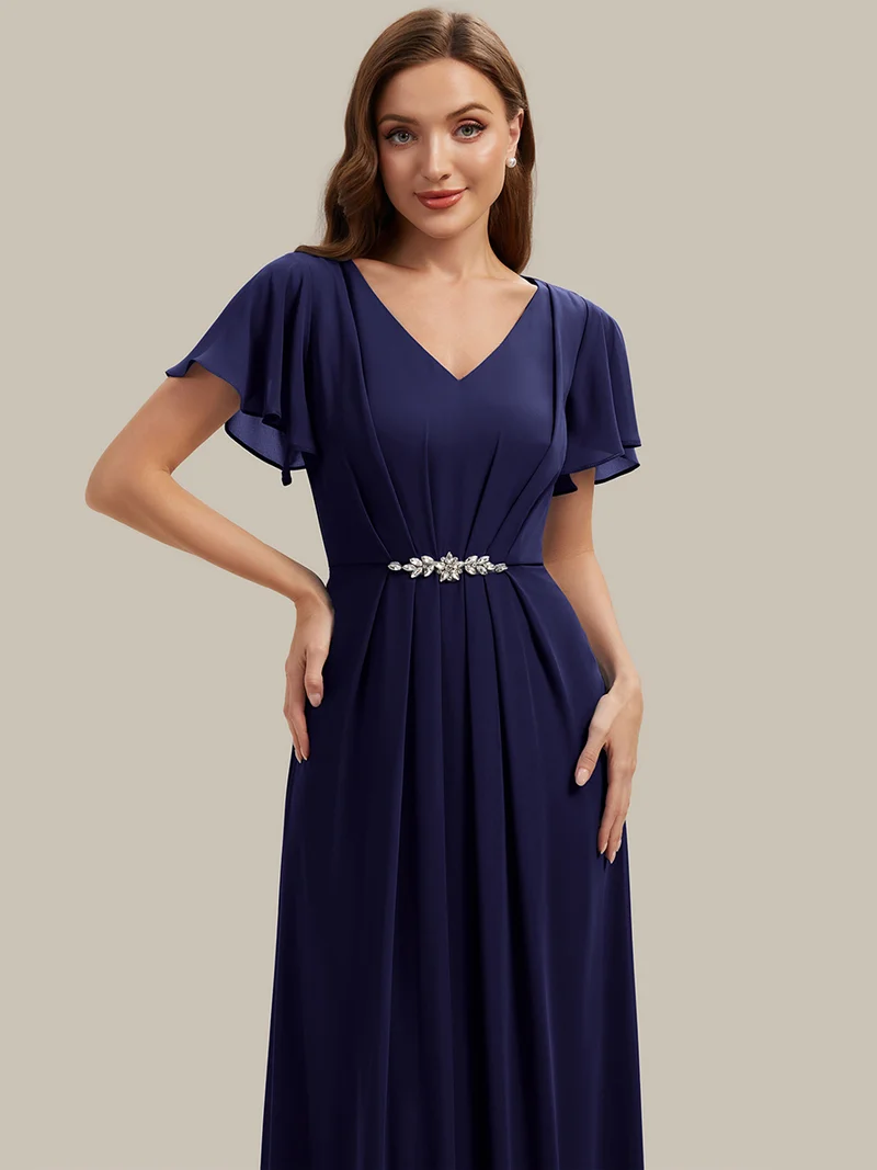 Robe d'invitée à col en V orné de strass et manches à volants