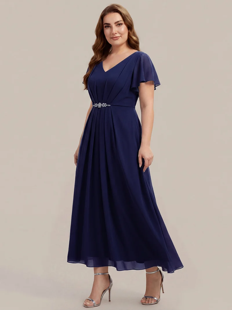 Robe d'invitée à col en V orné de strass et manches à volants