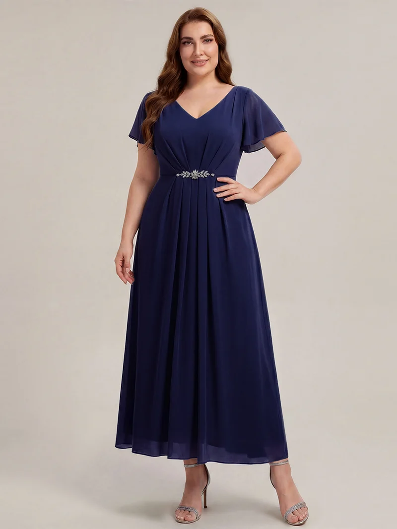 Robe d'invitée à col en V orné de strass et manches à volants