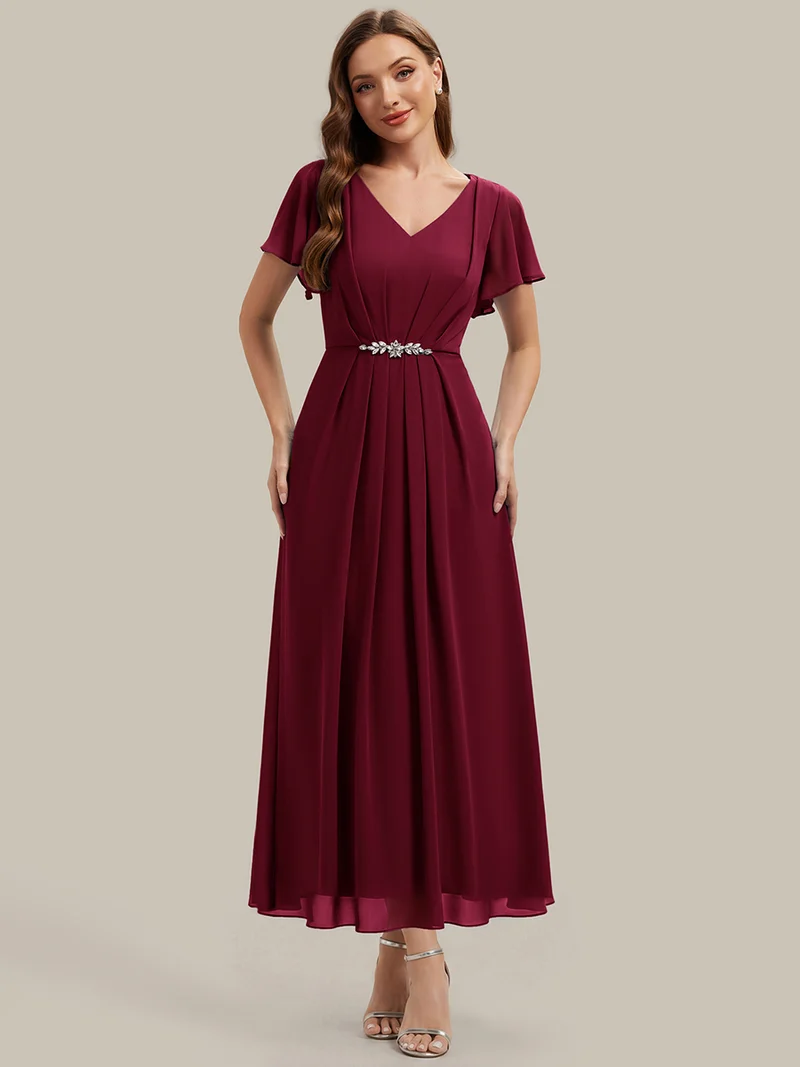 Robe d'invitée à col en V orné de strass et manches à volants