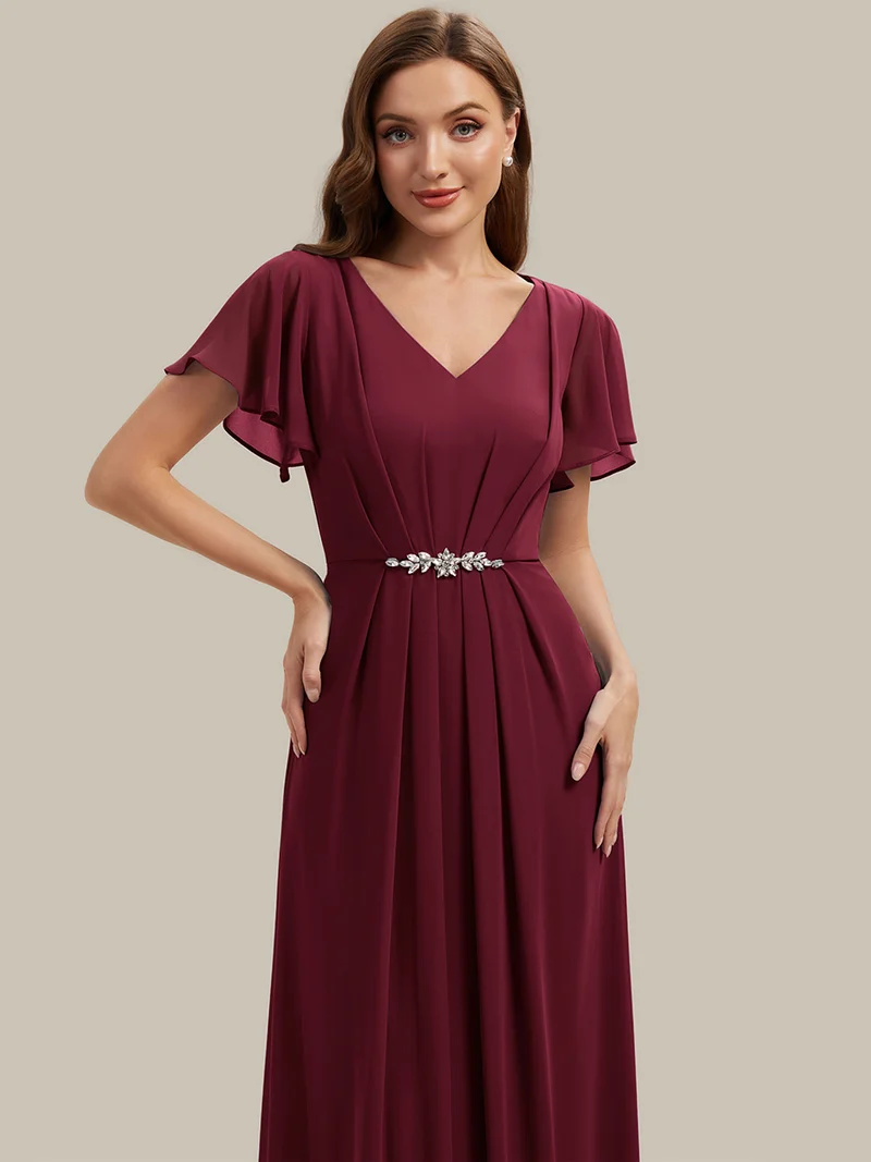 Robe d'invitée à col en V orné de strass et manches à volants