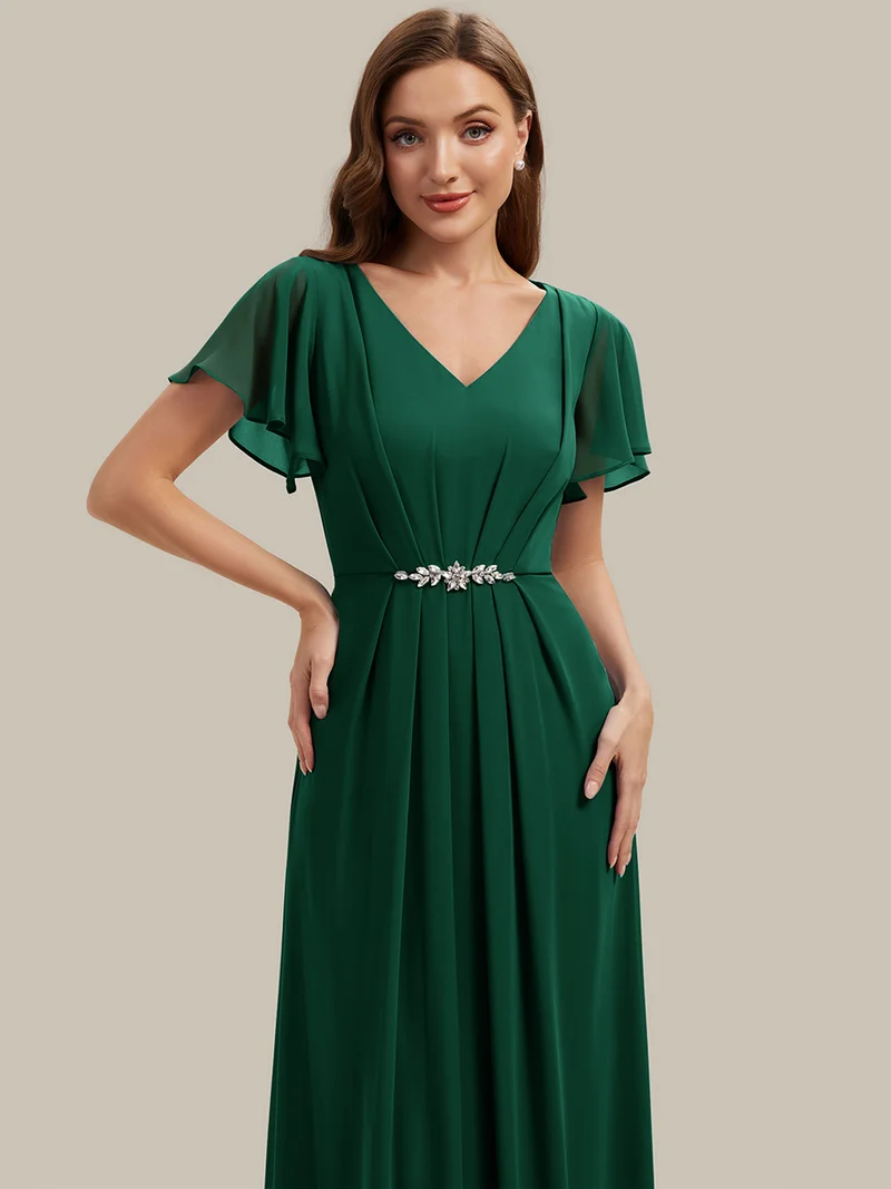 Robe d'invitée à col en V orné de strass et manches à volants