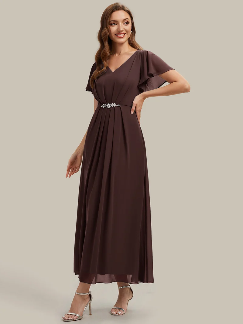 Robe d'invitée à col en V orné de strass et manches à volants