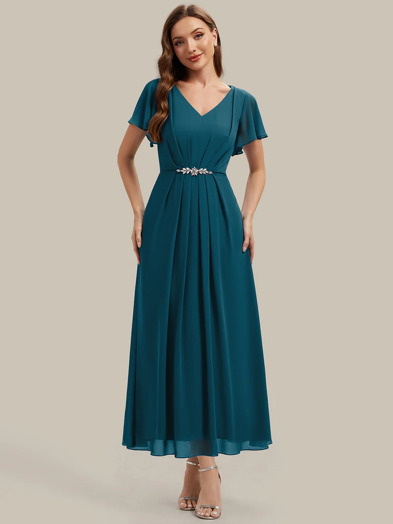 Robe d'invitée à col en V orné de strass et manches à volants