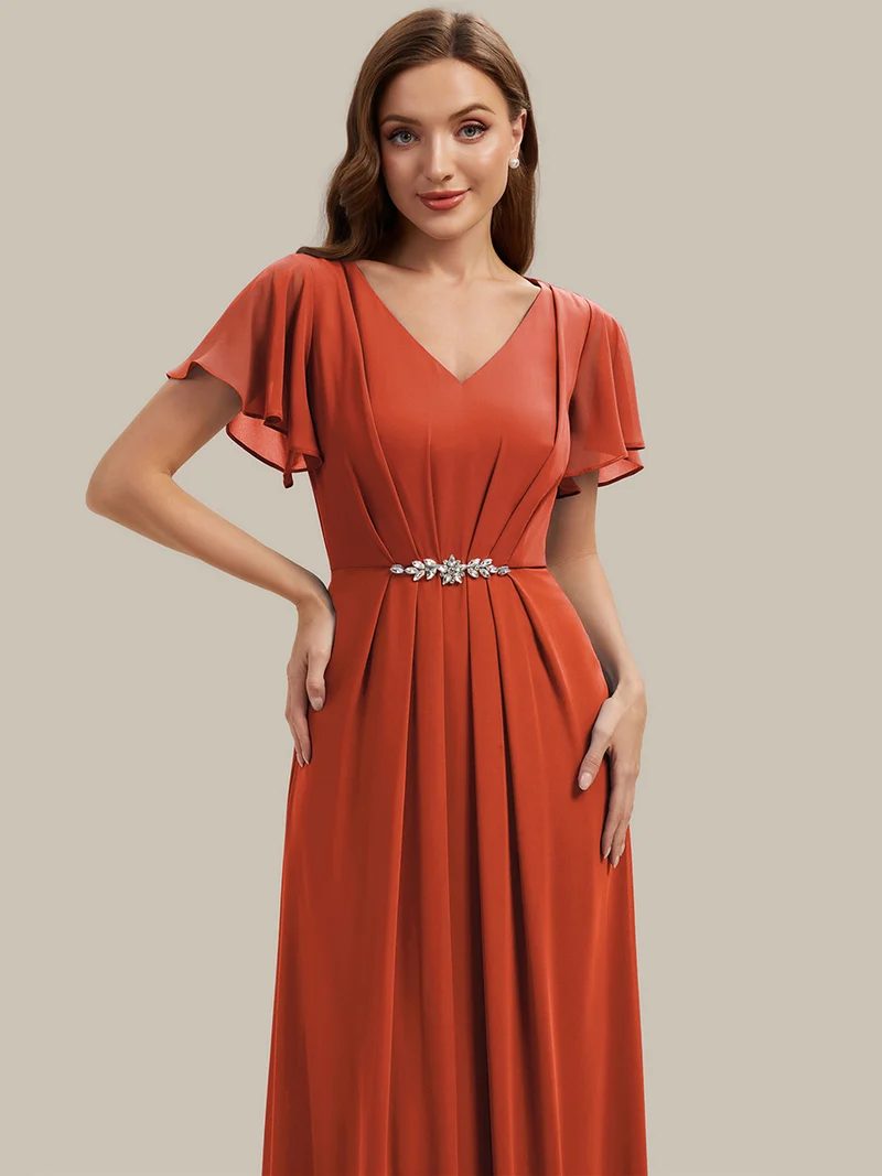 Robe d'invitée à col en V orné de strass et manches à volants