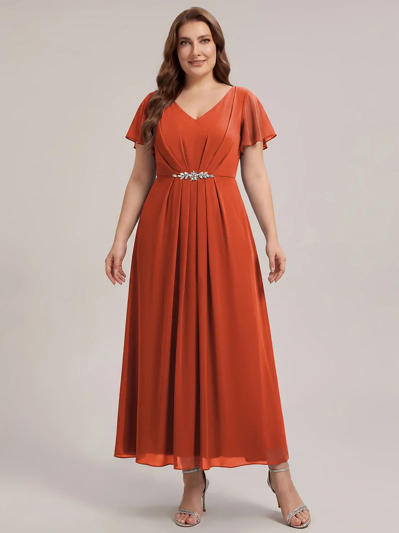 Robe d'invitée à col en V orné de strass et manches à volants