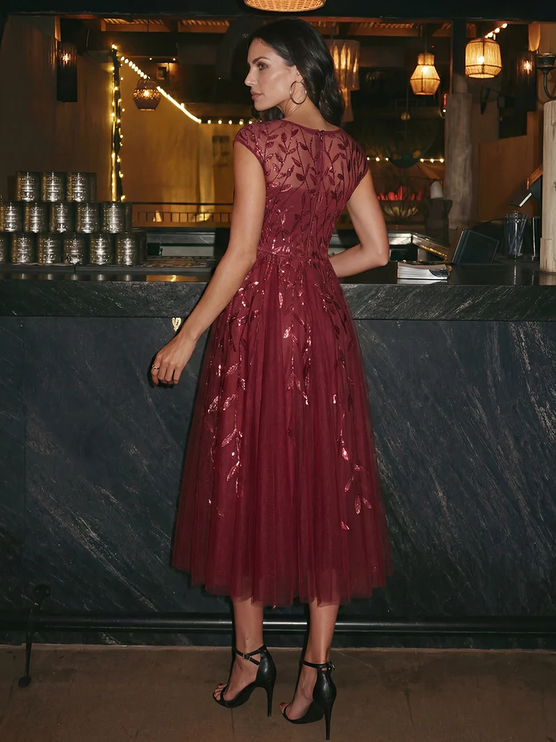 Robe Invitée Mariage Mi-Longue en Tulle Pailleté à Mancherons