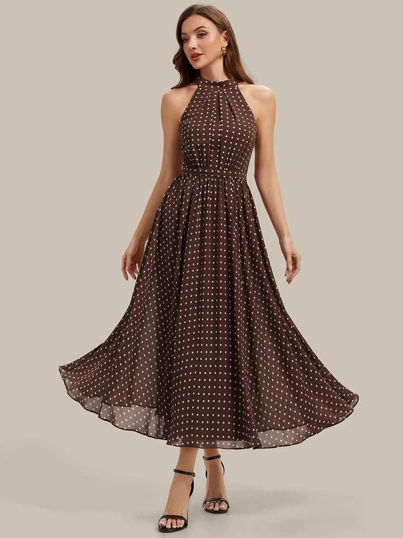 Robe dos nu à pois avec jupe en mousseline