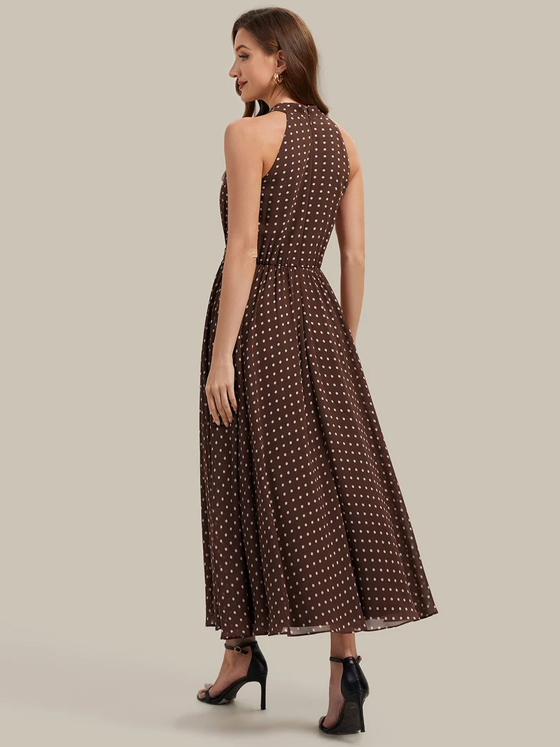 Robe dos nu à pois avec jupe en mousseline