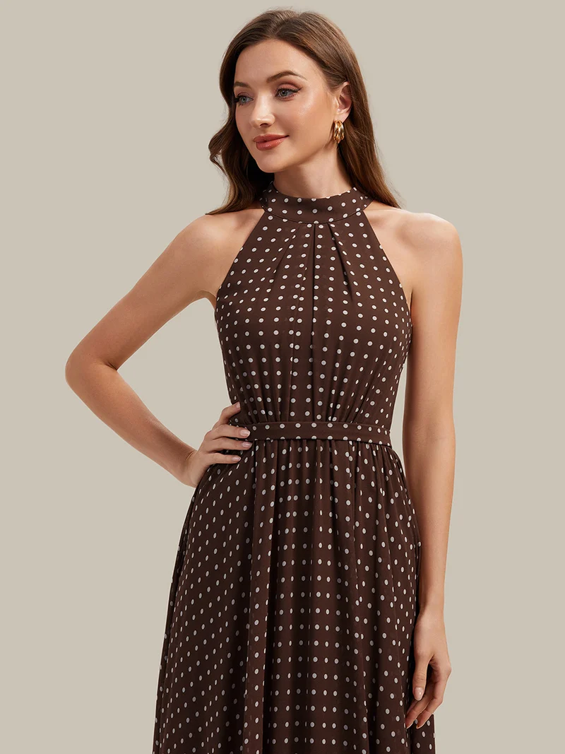 Robe dos nu à pois avec jupe en mousseline