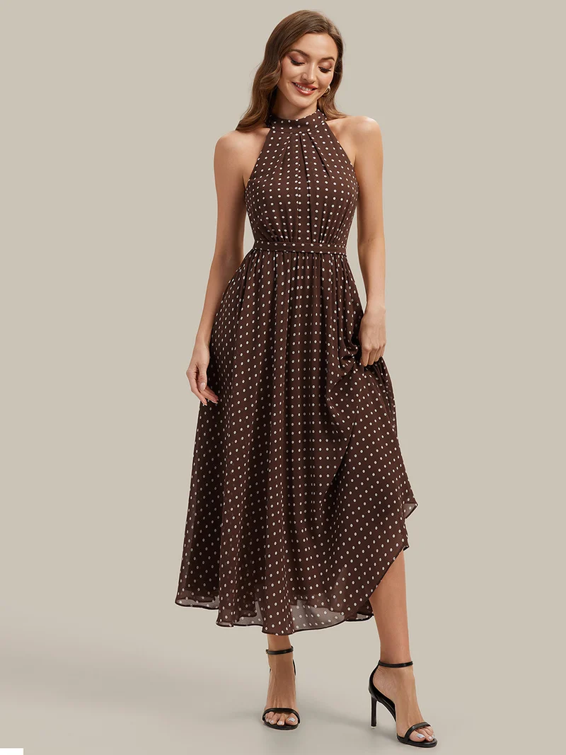 Robe dos nu à pois avec jupe en mousseline