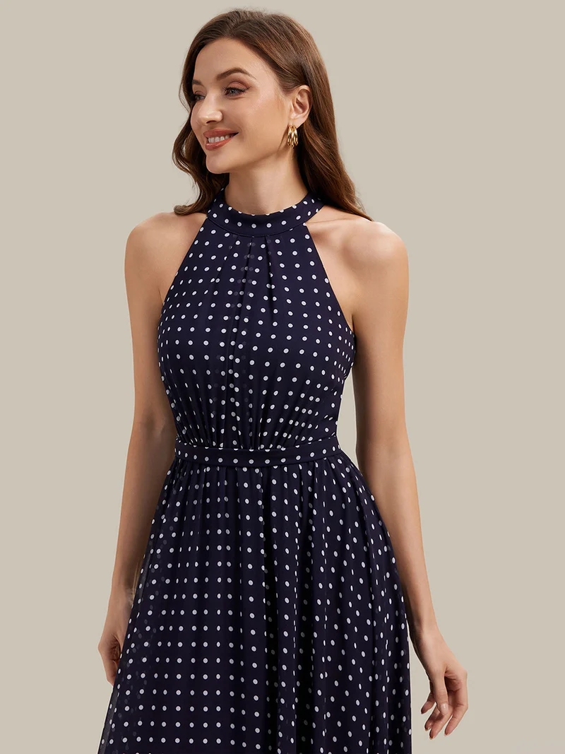 Robe dos nu à pois avec jupe en mousseline