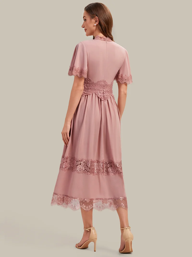 Robe midi en dentelle ajourée à col en V