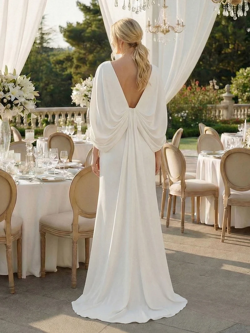 Robe sirène sans bretelles en stretch haut avec décolleté en V profond et manches cape