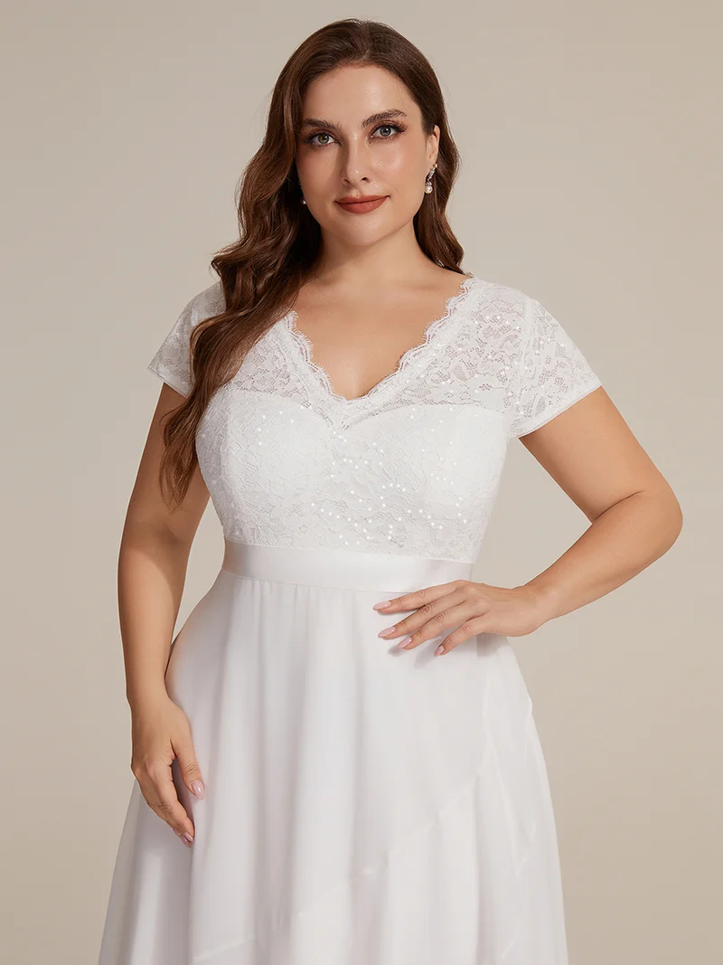 Robe élégante asymétrique à décolleté en V profond et volants