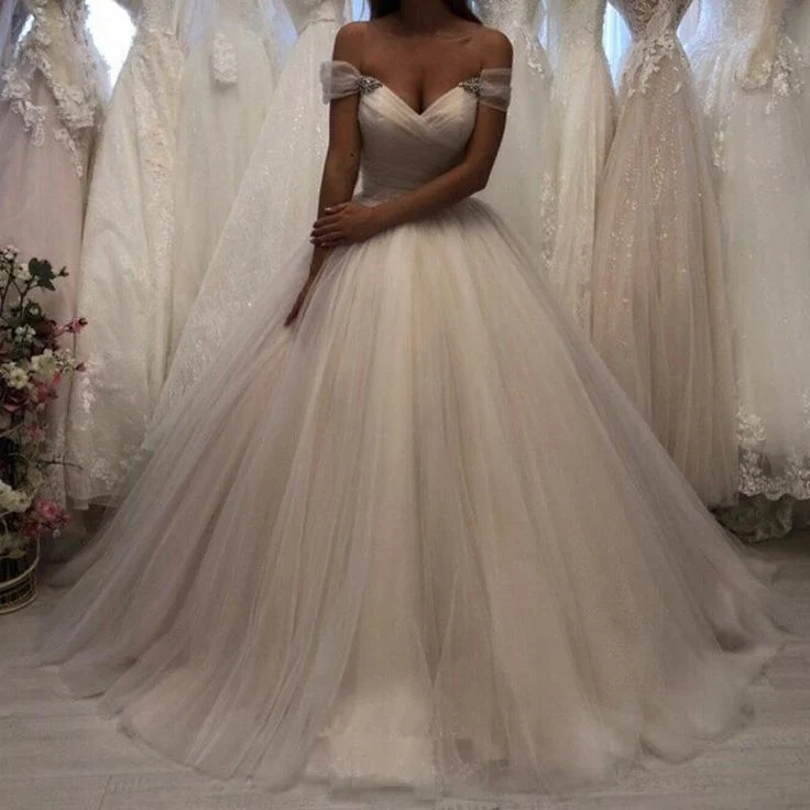 Robe de mariée en tulle ivoire à épaules dénudées avec jupe plissée et lacets