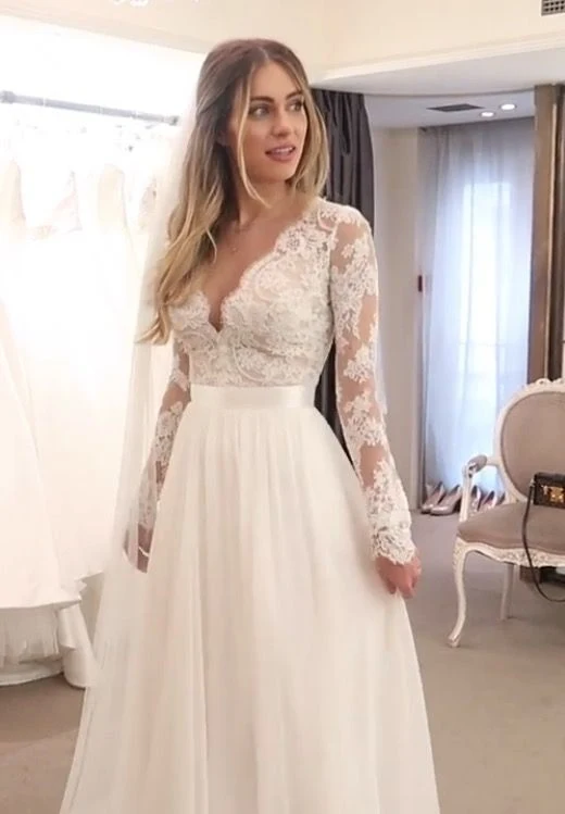 Robe de mariée princesse trapèze à manches longues et col en V en tulle avec appliques
