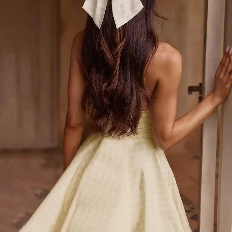Robe patineuse jaune évasée sans manches