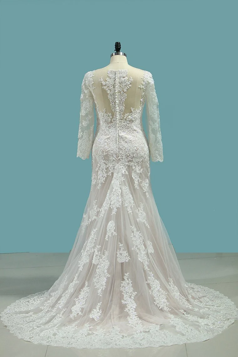 Robe de mariée sirène élégante à manches longues et col bateau, avec de magnifiques appliques en dentelle
