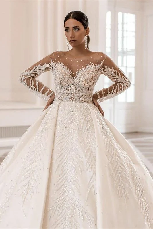 Robe de mariée glamour à manches longues, coupe trapèze, en satin, avec cristaux et perles