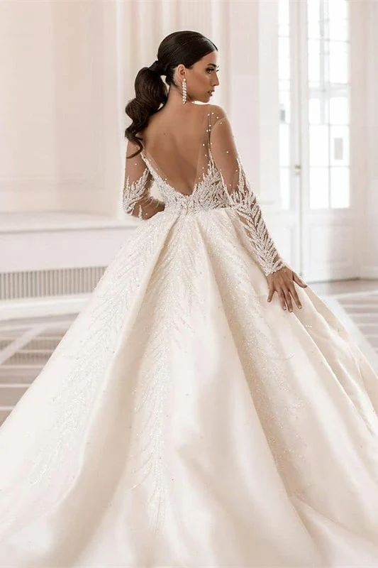 Robe de mariée glamour à manches longues, coupe trapèze, en satin, avec cristaux et perles