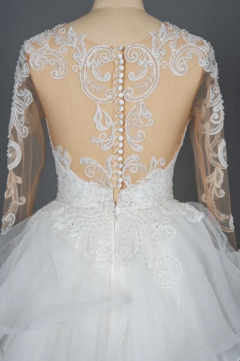 Robe de mariée trapèze à col en V avec volants, tulle et appliqués