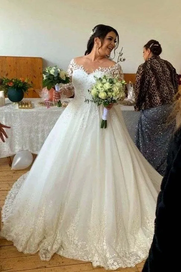 Robe de mariée glamour en dentelle florale à manches longues et col en V