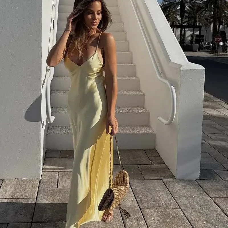 Robe longue jaune dos nu satinée