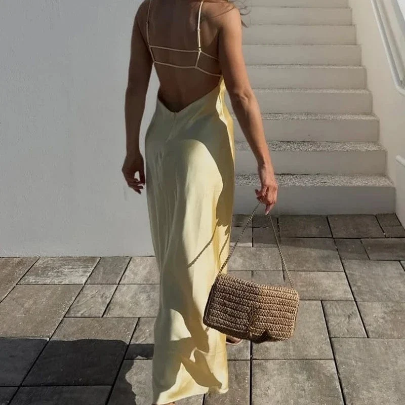 Robe longue jaune dos nu satinée
