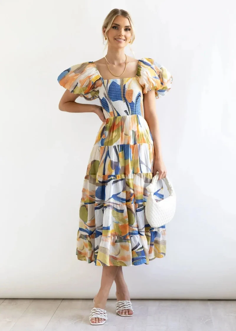 Robe fleurie midi épaules dénudées