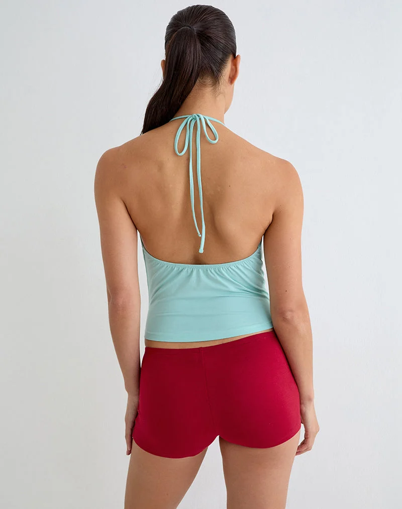 Haut à col roulé Kiri avec œillets, en jersey de rayonne, couleur aqua
